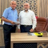 لقاء الأستاذ الدكتور خالد مصطفى السراحنة عميد الكلية بالدكتور نعيم أبو شرخ عضو لجنة بناء كلية العلوم الإسلامية